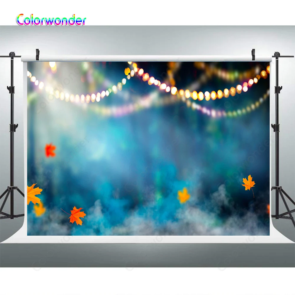 Фон для фотосъемки с яркими блестками и кленовыми листьями абстрактный синий фон