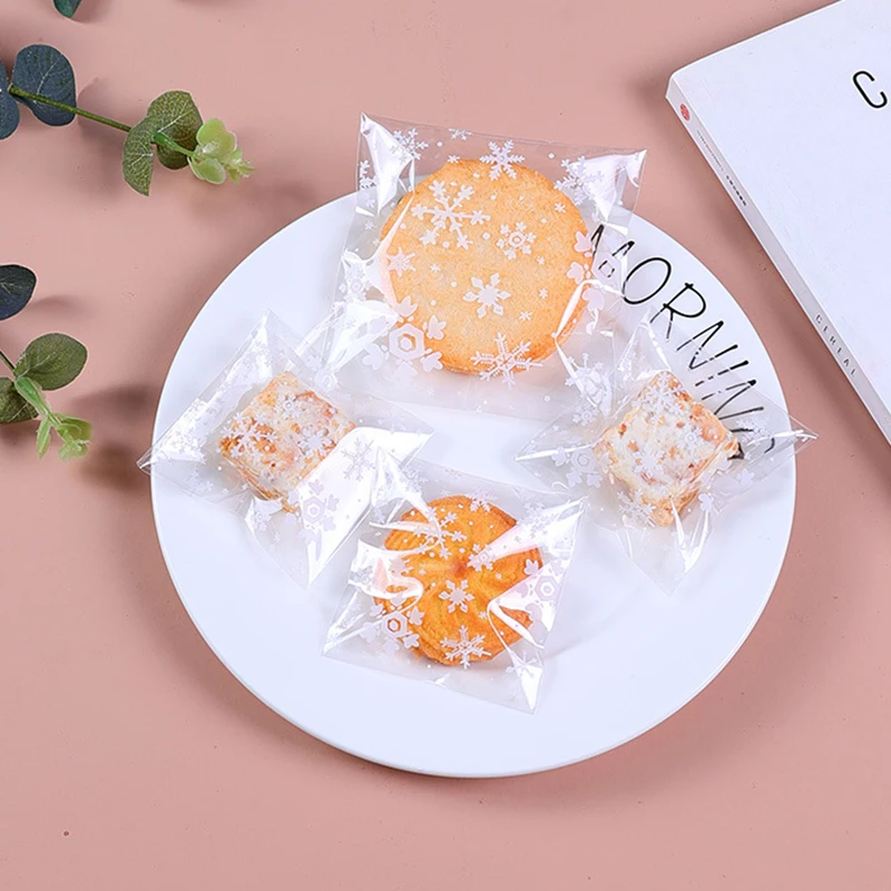 

100Pcs Plastic Transparent Candy Bag Snowflake Self-adhesive Bag Cookies Snacks Baking Frosted Wedding Party Party Gift Bag