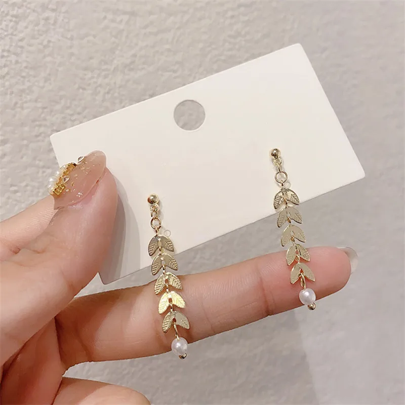 

HanGuodong Gate in same metal leaf pearl earrings female temperament of contracted joker tassel earringstud