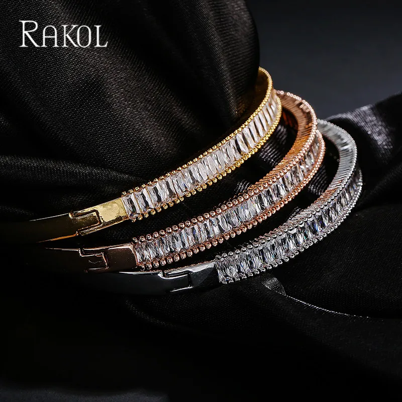 Женский браслет с кристаллами циркония RAKOL свадебный золотистого цвета