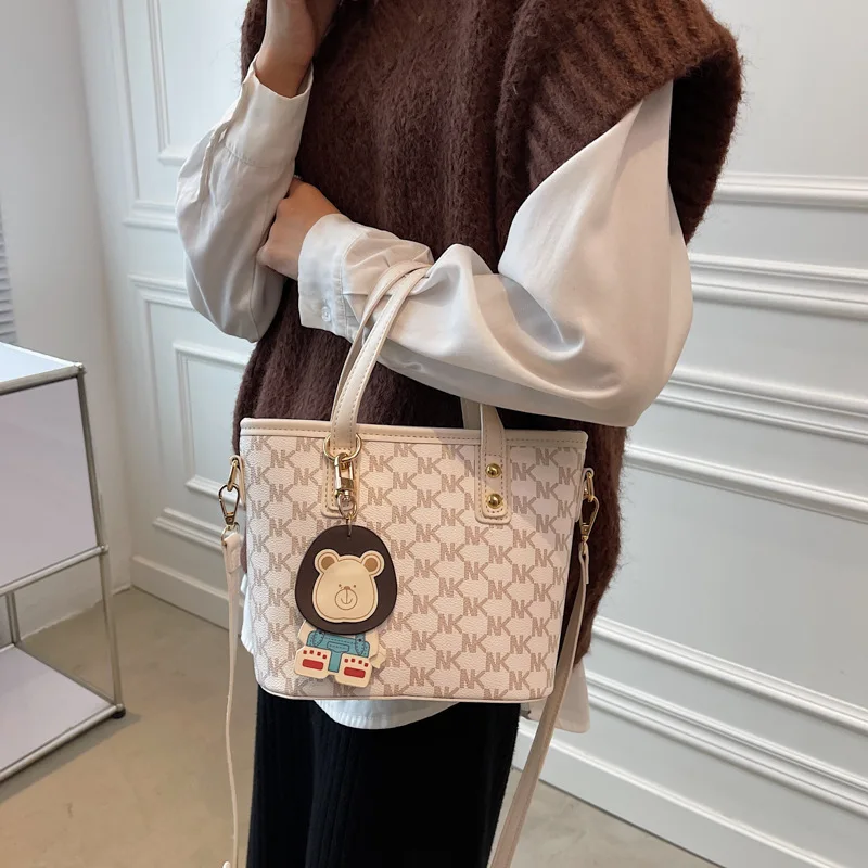 

Portable bag women's 2021 new trendy letter printed bucket bag versatile fashion One Shoulder Messenger Bag