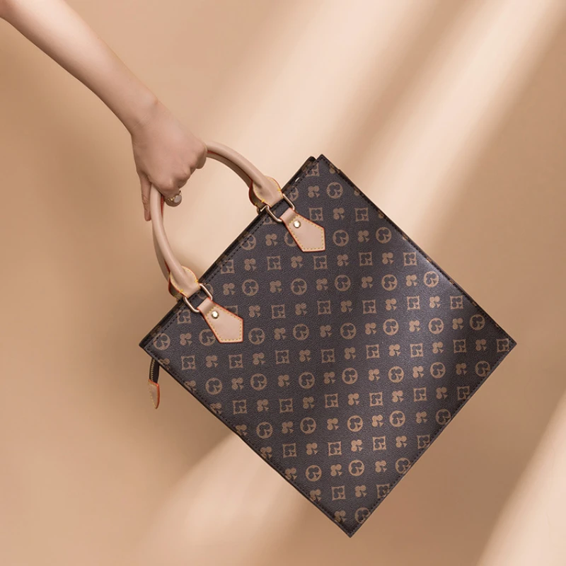 

Портфель известного бренда для мужчин и женщин, новинка 2021, вместительная кожаная сумка с принтом, вертикальная Сумка для документов, сумка ...