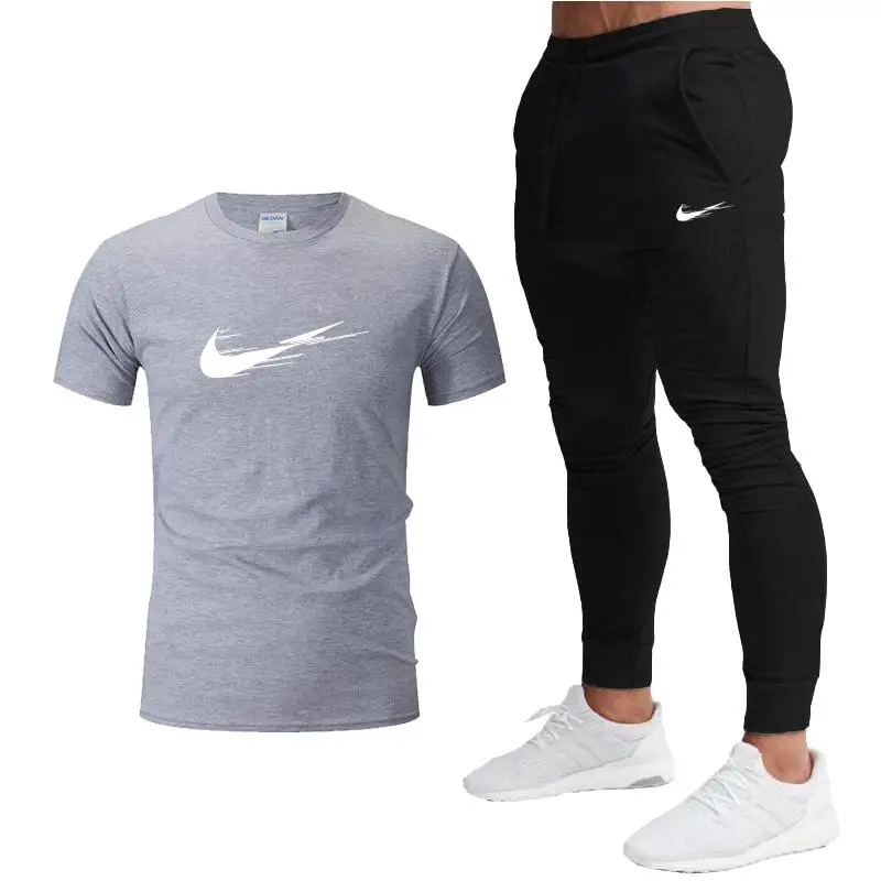 

2021 spring and summer men's leisure sports fitness jogging round neck printing short sleeve + sports pants suit two-piece