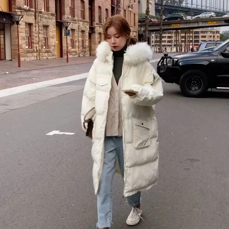 

Cotton-padded jacket women's mid-length section 2021 new winter Korean version of loose down padded jacket long section over-the