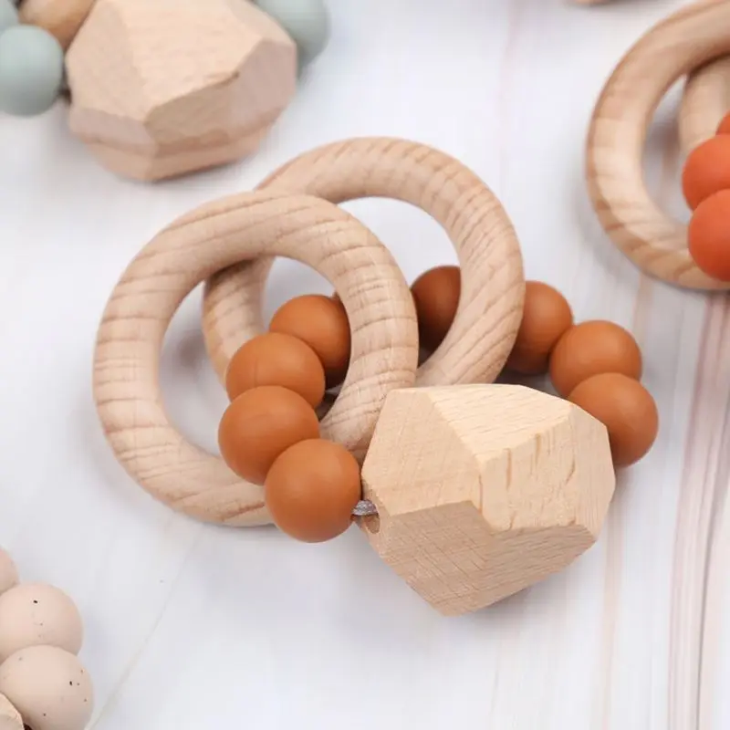 

Wooden Rattle Beech Hand Teething Ring Baby Teether Play Gym Montessori Toy