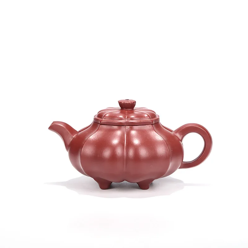 

Yixing purple clay teapot new four legged water chestnut teapot