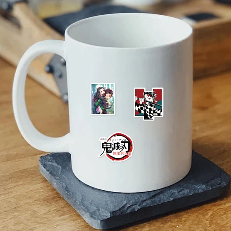 

100Pcs Demon Slayer Unlimited Train Anime Stickers Waterproof Skateboard Motorcycle Guitar Luggage Laptop Bicycle Sticker Toys