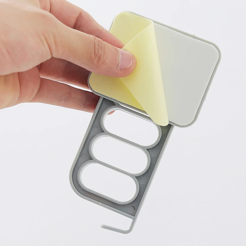 

Wall-mounted glue Four-hole row hook multi-function hooks Nordic home wall-mounted non-marking glue hooks