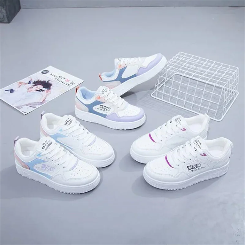 Женские кроссовки из ПУ кожи розовые на плоской вулканизированной подошве