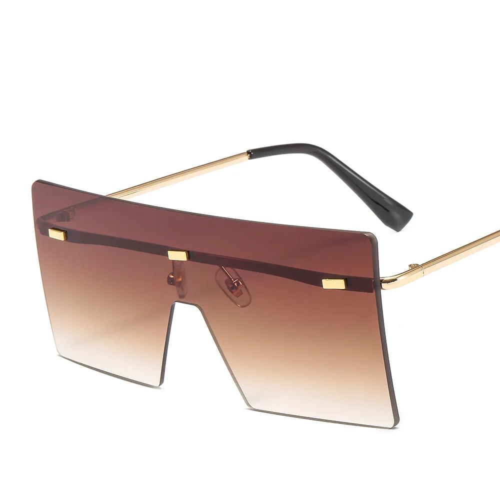 

Free shipping New frameless conjoined Sunglasses square large frame sunglasses Fashion ocean color sunglasses