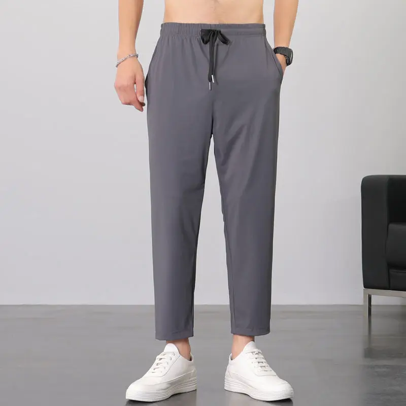 

2021 Summer Thin Ice Silk Casual Pants Men's Black Korean Loose Large Street Style Fashion Brand Men's Casual Sports Trousers