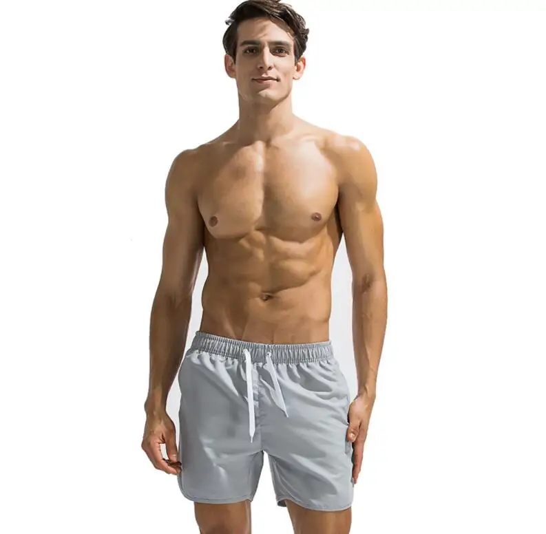 Solid color straight loose beach pants with slit pockets sports style five-point shorts short pants