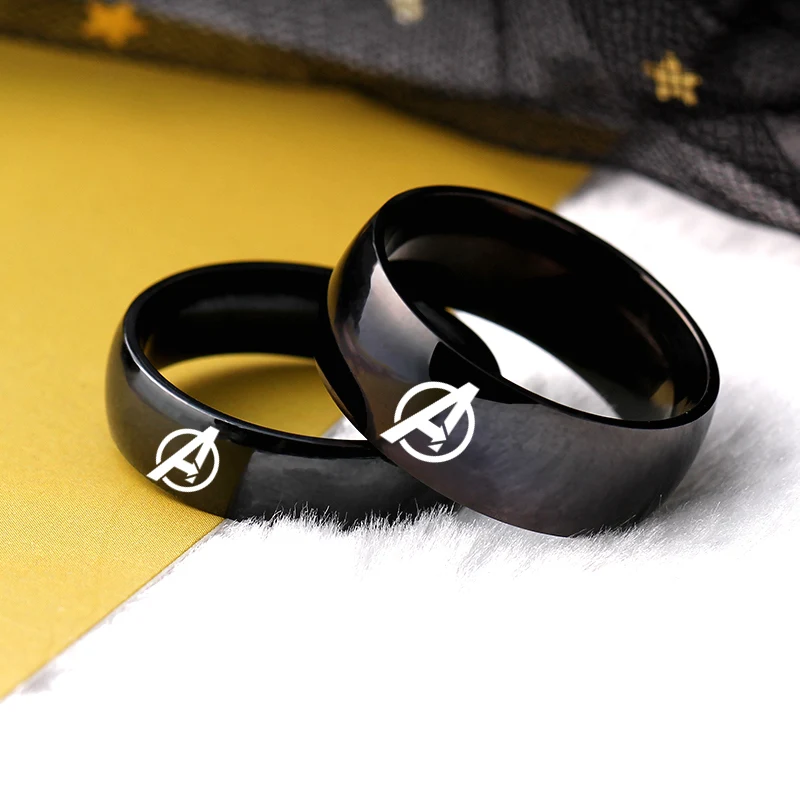 

Парное кольцо из титановой стали черного цвета для женщин и мужчин, кольцо для влюбленных из нержавеющей стали, обручальные кольца с логоти...