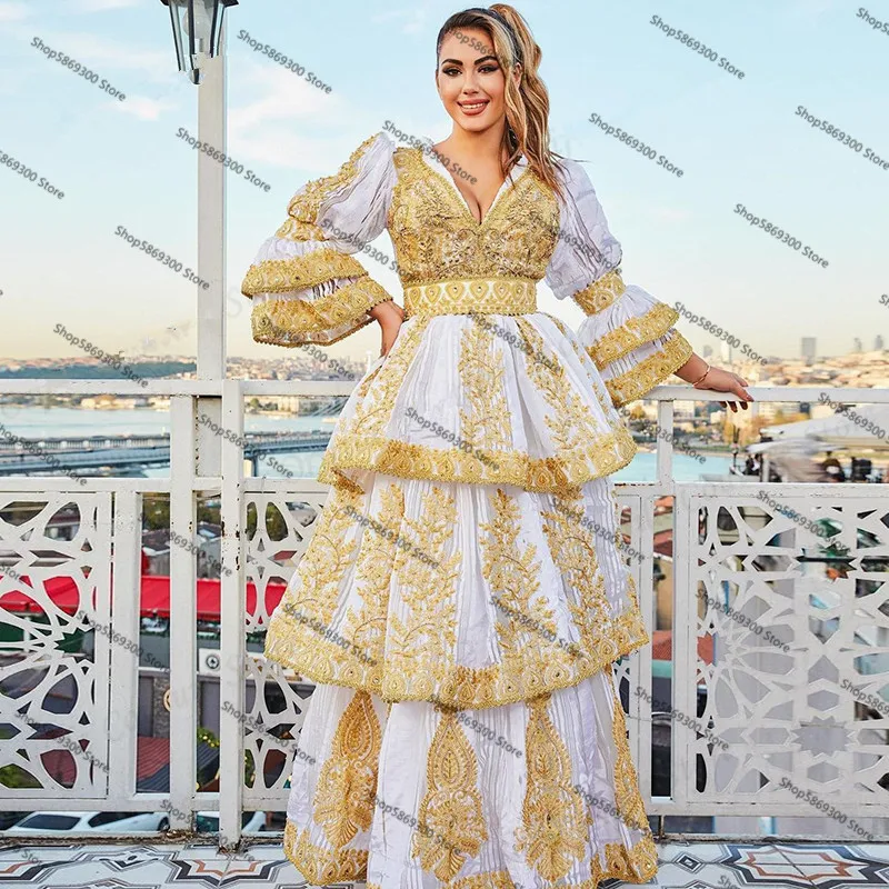 

Платье женское вечернее золотистое с длинными рукавами и аппликацией