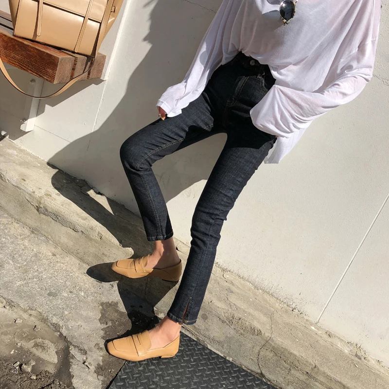 Женские джинсы с разрезом сбоку Mozuleva черные повседневные Стрейчевые высокой