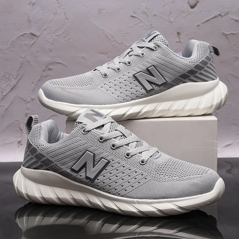 

New high-end balance shoes for men and women, lightweight and breathable flying woven couple shoes, outdoor sports jogging shoes