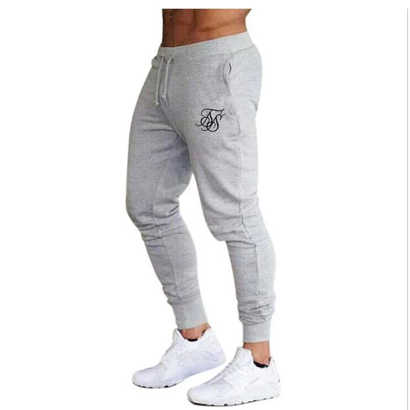 Брюки мужские для фитнеса Брендовые повседневные эластичные штаны одежда