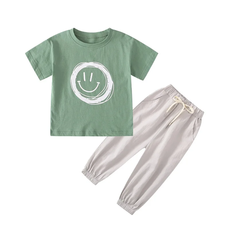 Комплект детской однотонной футболки со смайликом и принтом лимона 2