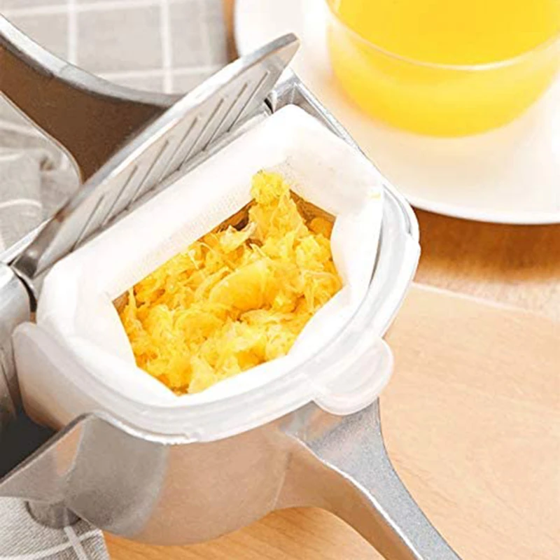 

Manual Fruit Juicer Hand Press Kitchen Grade Aluminum Alloy with PTFE Coating - Silver,2 Reusable Filter Bags Included