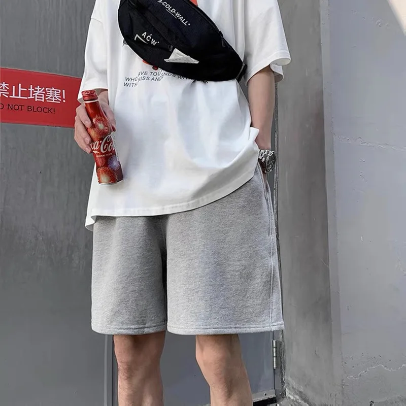 

Summer new shorts men's loose and versatile sports casual 5-point pants trend Korean cool pure color straight pants
