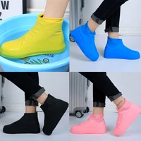 a pair of reusable silicone waterproof rain boot covers unisex shoe protectors for indoor rain outdoor rain boots