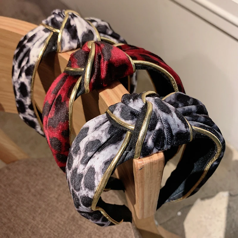 Женская элегантная леопардовая повязка на голову с золотыми линиями и узлом
