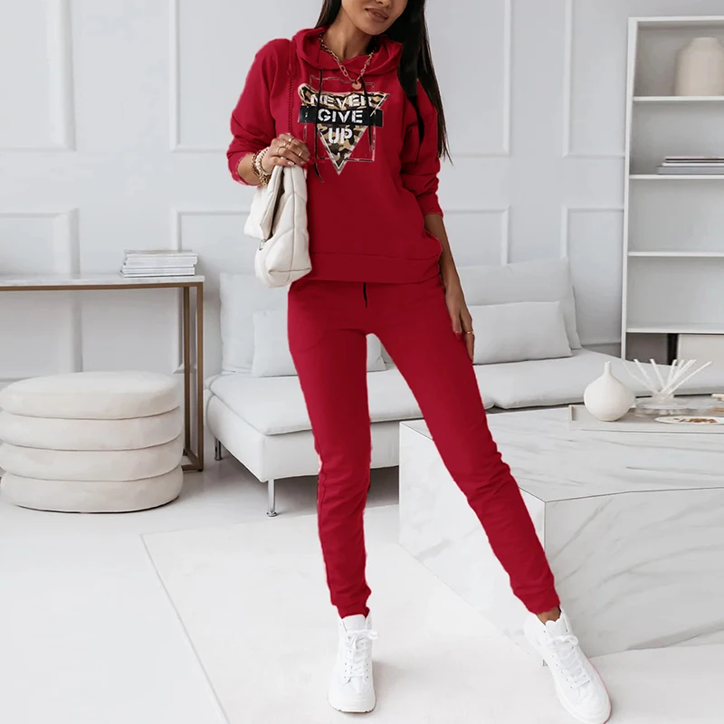 Женский костюм с топом капюшоном и брюками на шнуровке повседневный облегающий