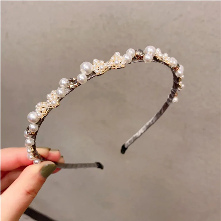 

Women Spring new pearl bow knot temperament hairbands simple and versatile exterior decoration