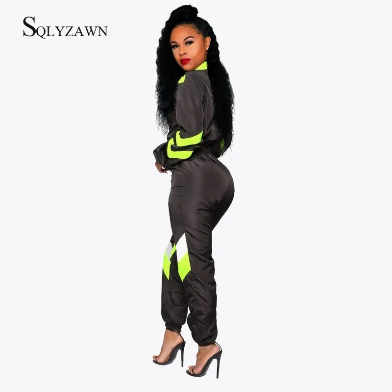 Женский спортивный комбинезон на молнии с длинным рукавом и цветными блоками