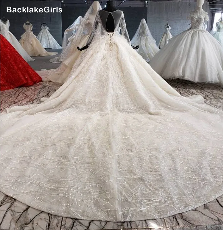 Высокая Класс Свадебные платья с длинными рукавами и головной повязкой пером 2020