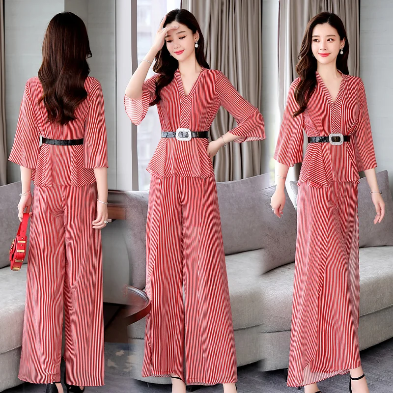 Женский костюм из двух предметов блузка в полоску и брюки с широкими штанинами