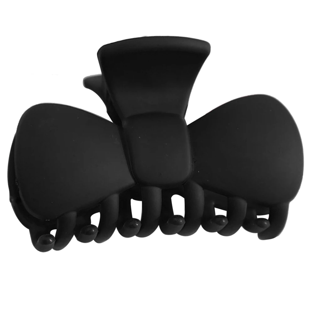 Заколка-зажим для волос в виде банта карамельного цвета |