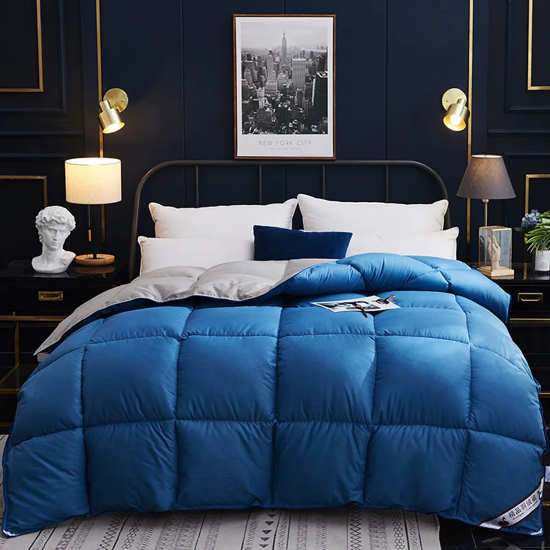 للبيع لحاف سرير أوزة أبيض 95% للفصول الأربعة يحفظ الدفء لحاف أنيق للفنادق بلون سادة بطانية مبطنة للأسفل