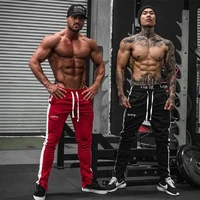 muscle training fitness sports popular logo casual trousers breathable slim all match fashion mens small foot girdle pants