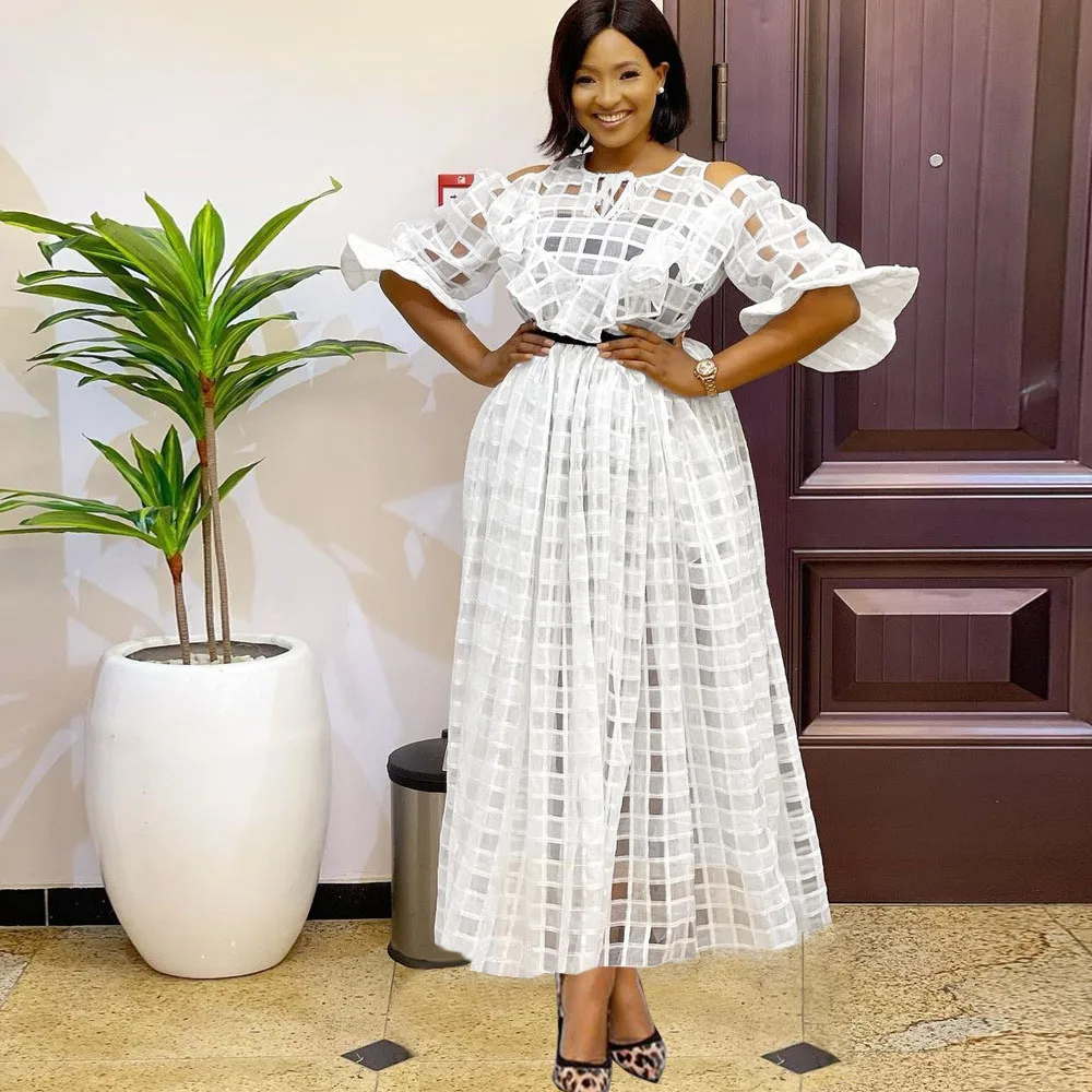 

Новинка осени 2021, однотонное модное темпераментное привлекательное Прозрачное платье с круглым вырезом, сетчатыми расклешенными рукавами,...