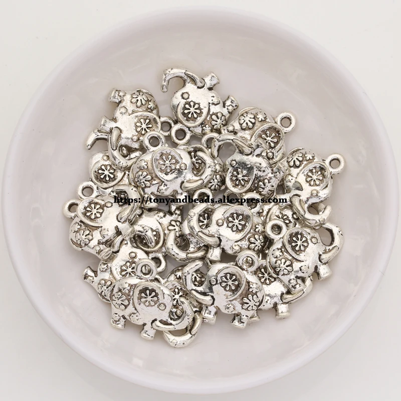 

(50Pcs/Lot) Zinc Alloy Tibetan Silver European Charm Flower Elephant-Shape Pendant Size 16X15mm ZN42809