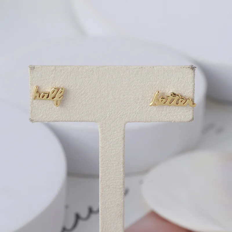 

European and American Simple and Compact Glossy Letters Asymmetric Fashion Stud Earrings for Women