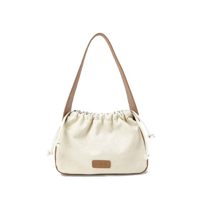 

2021 New Design Simple and Fashionable Folding One-shoulder Canvas Underarm Ladies Drawstring Shoulder Bag Cute One-shoulder
