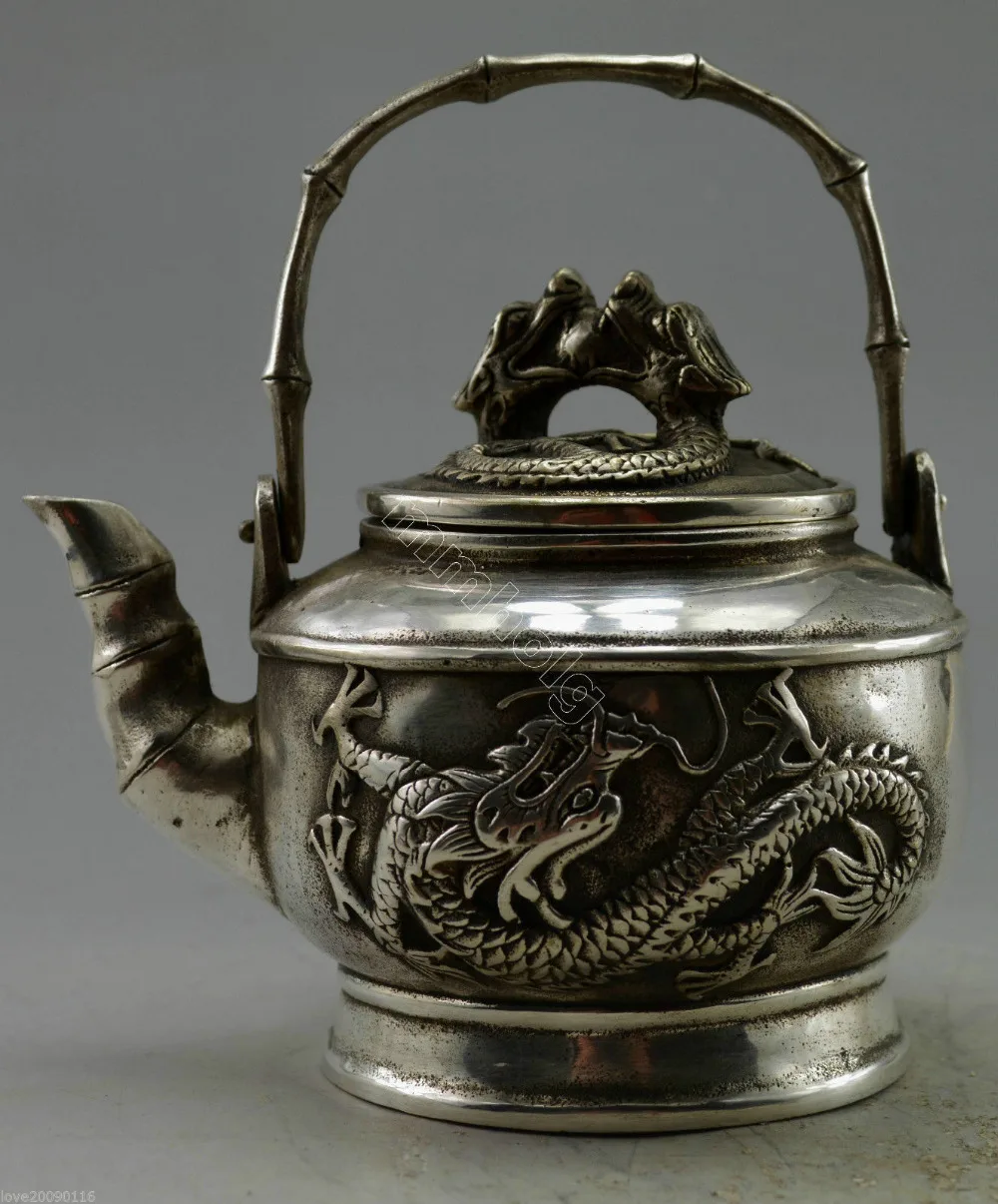 

Collectible home Decorated Old Handwork Tibet miao Silver Carved Dragon Bamboo TeaPot metal crafts