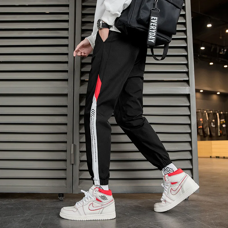

Men's 2021 spring and summer sports nine-point casual pants Korean version of the trend of men's leggings tide brand tooling lon