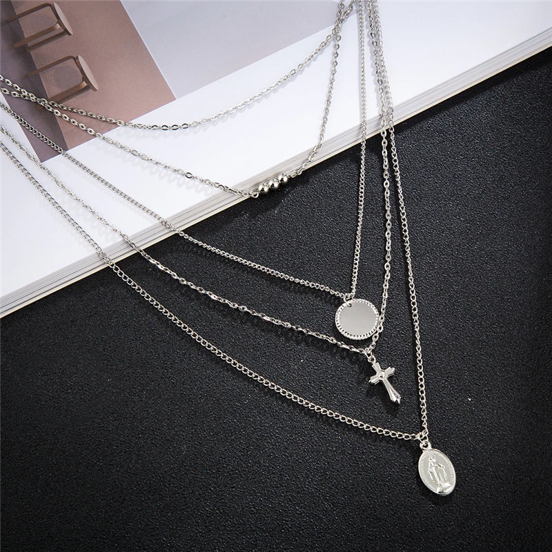 Женская цепочка с подвеской в виде креста серебристого цвета | Украшения и