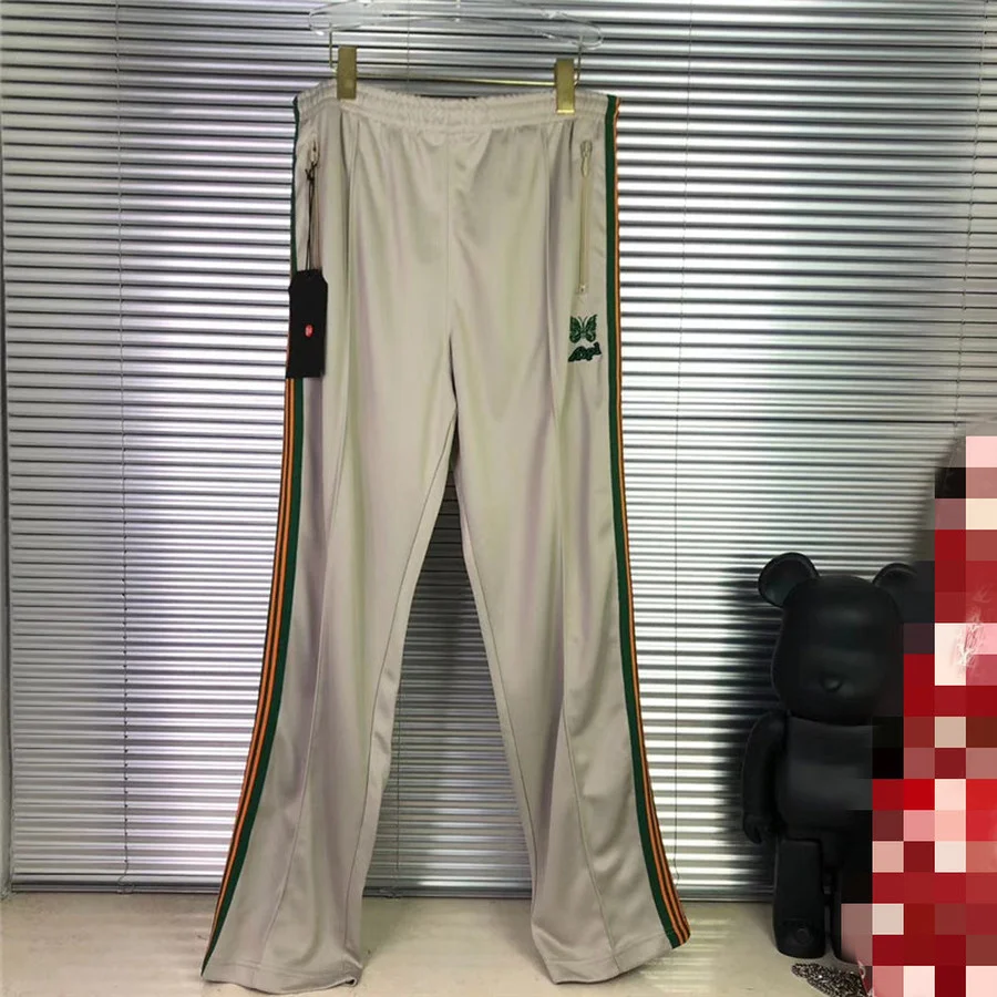 

Брюки спортивные персиковые с вышивкой-бабочкой для мужчин и женщин