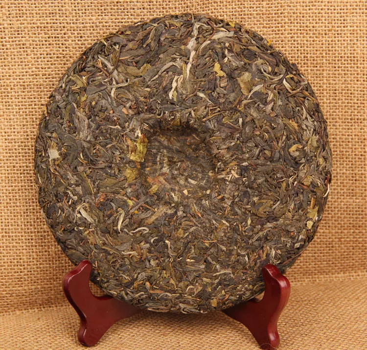 

Nanpu'er Tea Daxueshan Pu'er Tea Raw Tea Seven-seed Cake Tea Pu'er Tea Cake Ancient Tree Collection 357g weight loss