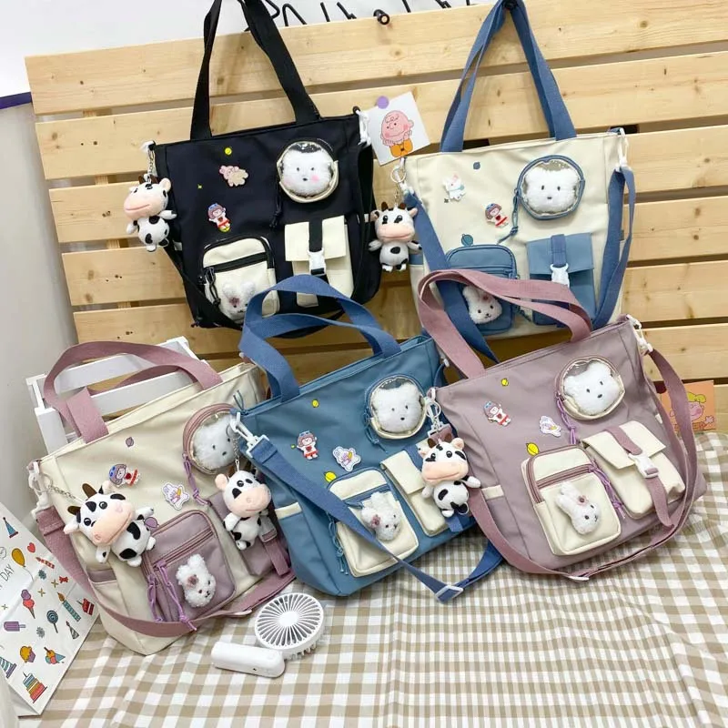 Large-capacity student class bag 2021 new Japanese ins cute soft girl shoulder bag campus cartoon messenger bag.