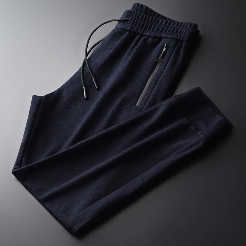 

autumn new men's dark pattern casual pants are fashionable versatile. Elastic waist, necking foot binding sports