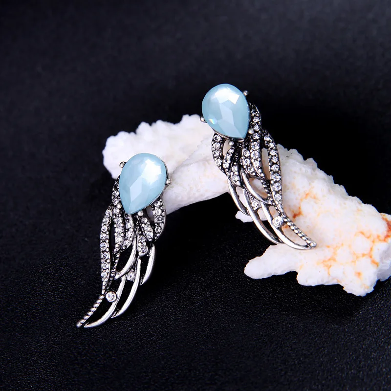 

Charm Crystal Vintage Earrings 2021 Women Angel Wings Luxury Elegant Silver Color Piercing Stud Earrings Jewelry