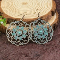 2021 wholesale turquoise hollow tassel alloy earrings female geometric pattern classic ethnic style earrings jewelry for women