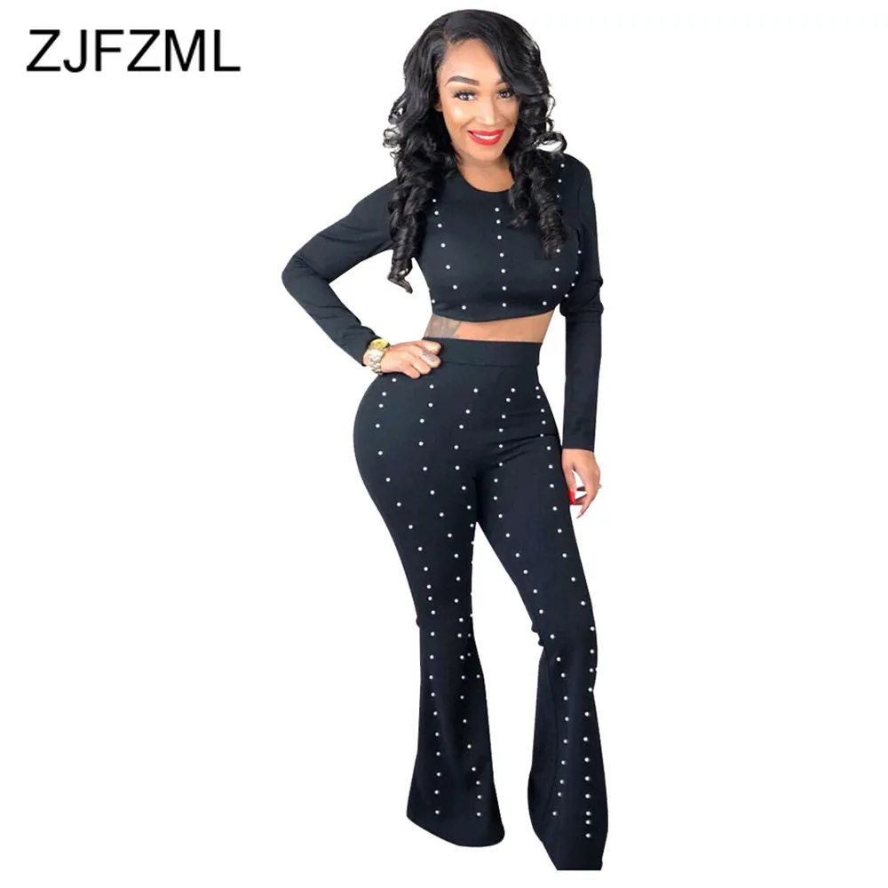 

Женский комплект из двух предметов, обшитый бисером, короткий топ с длинным рукавом и расклешенные штаны