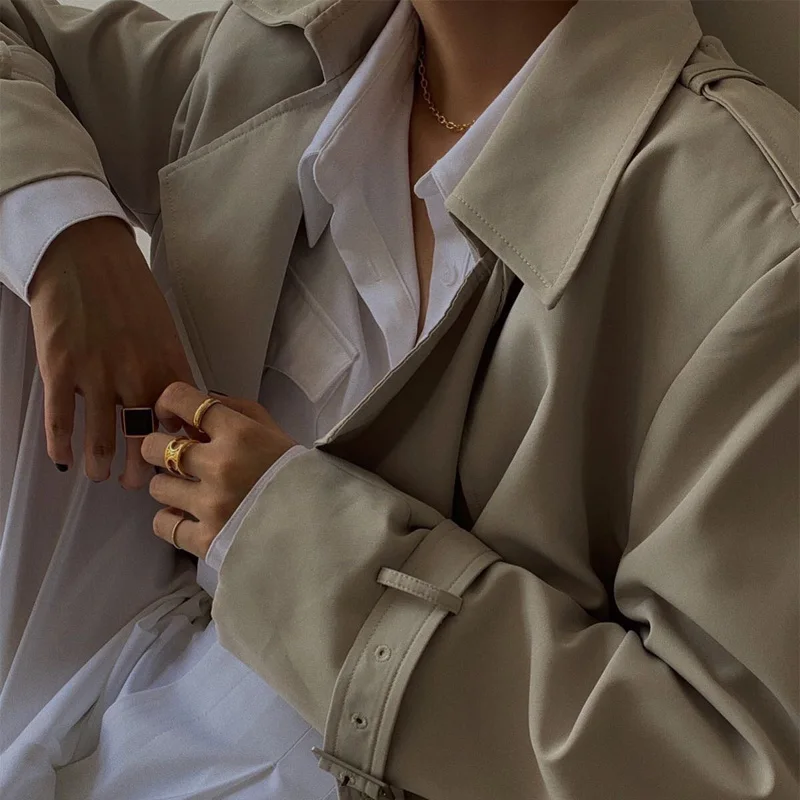 

Autumn and winter women's windbreaker casual solid color belt decoration windbreaker