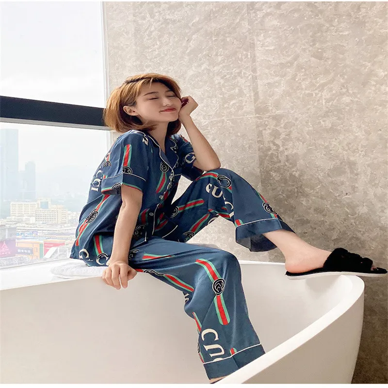 

Summer New Women's Ice Silk Summer Short-Sleeved Trousers Cardigan Pajamas Large Size Loose Silk Home Service Suit